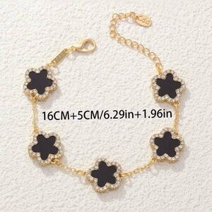 Gold plated black clover bracelet